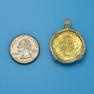 Pendant size next to a Quarter