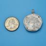 Pendant size next to a Quarter