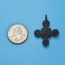 Cross size next to a Quarter