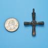 Cross size next to a Quarter