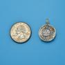 Pendant size next to a Quarter