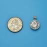 Pendant size next to a Quarter