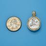 Pendant size next to a Quarter