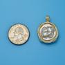 Pendant size next to a Quarter
