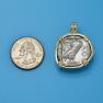 Pendant size next to a Quarter