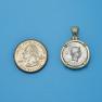 Pendant size next to a Quarter