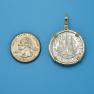 Pendant size next to a Quarter