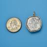 Pendant size next to a Quarter