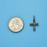 Cross size next to a Quarter