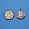 Pendant size next to a Quarter