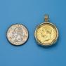 Pendant size next to a Quarter