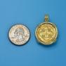 Pendant size next to a Quarter
