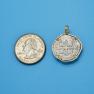 Pendant size next to a Quarter