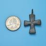 Cross size next to a Quarter
