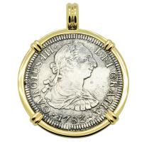Spanish 2 reales dated 1783 in 14k gold pendant, The 1784 Shipwreck that Changed America.