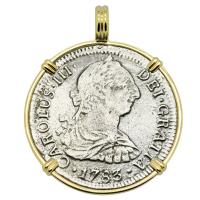 Spanish 2 reales dated 1783 in 14k gold pendant, The 1784 Shipwreck that Changed America.