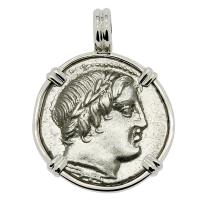 Roman Republic 86 BC, Apollo and Jupiter chariot denarius in 14k white gold pendant.