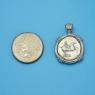 Pendant size next to a Quarter
