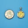 Pendant size next to a Quarter