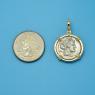 Pendant size next to a Quarter