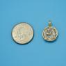 Pendant size next to a Quarter