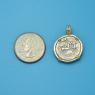 Pendant size next to a Quarter