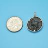 Pendant size next to a Quarter