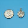 Pendant size next to a Quarter