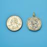 Pendant size next to a Quarter