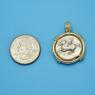 Pendant size next to a Quarter