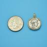 Pendant size next to a Quarter