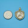 Pendant size next to a Quarter