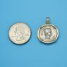 Pendant size next to a Quarter