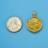 Pendant size next to a Quarter