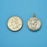 Pendant size next to a Quarter