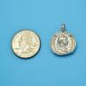 Pendant size next to a Quarter