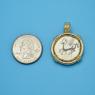 Pendant size next to a Quarter