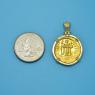 Pendant size next to a Quarter