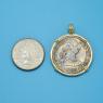 Pendant size next to a Quarter