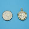 Pendant size next to a Quarter