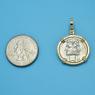 Pendant size next to a Quarter