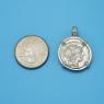 Pendant size next to a Quarter