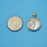 Pendant size next to a Quarter