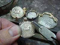 Each coin is custom framed into a variety of distinct gold or silver jewelry